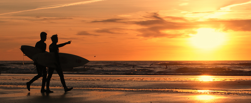 Surfers at Rømø Sunset